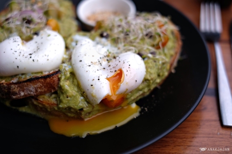 Smashed Avocado and Feta Cheese with Poached Egg on Sourdough IDR 65k